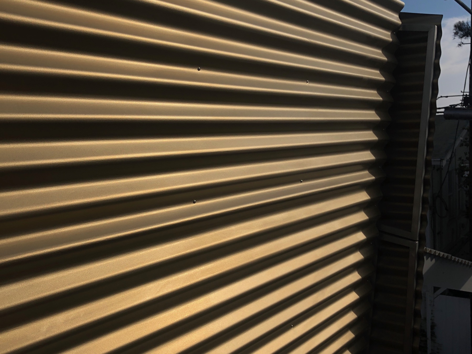 Corrugated Titanium Panels for Floating Beach House