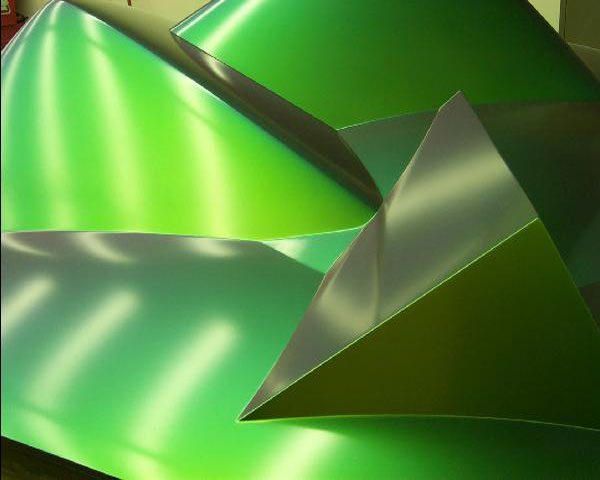 A green and silver abstract background with a triangle.